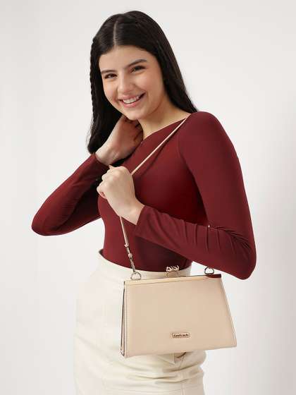 Fastrack
                        Nude-Coloured Box Clutch with Shoulder Straps