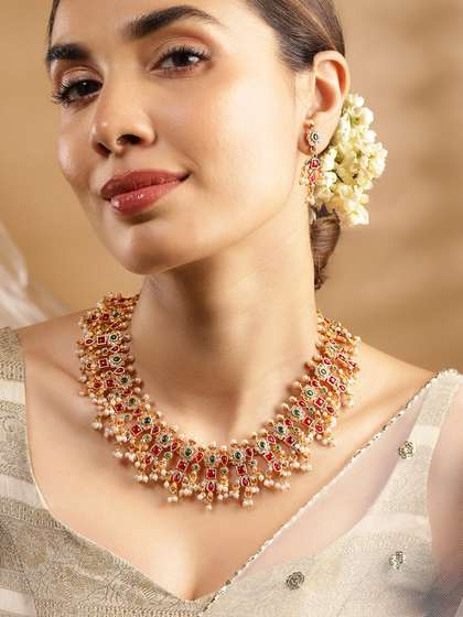 Rubans 24K Gold
                        Plated Handcrafted Ruby & Emerald Studded
                        & Pearl Beaded Jewellery Set