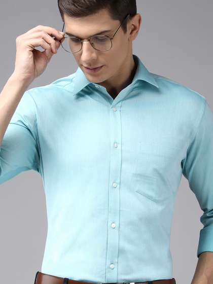 Park Avenue Men
                          Turquoise Blue Solid Slim Fit Formal Shirt