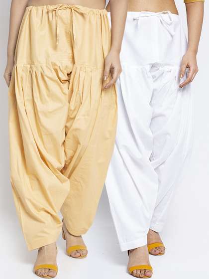 Jinfo Set Of 2 Women
                        White & Beige Solid Loose Fit Pure Cotton
                        Salwar