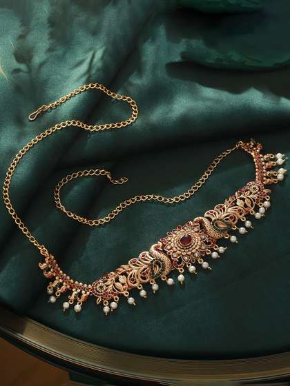 Saraf RS Jewellery
                        Gold-Plated Pink & Green Stone Studded &
                        Pearl Beaded Kamarband