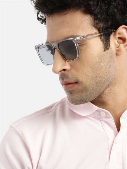 Voyage Unisex Grey
                        Lens & White Wayfarer Sunglasses with UV
                        Protected Lens