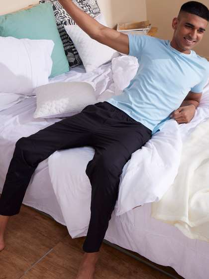 DAMENSCH Men Solid
                        Black Stretch Cotton Tapered Woven Lounge Pants