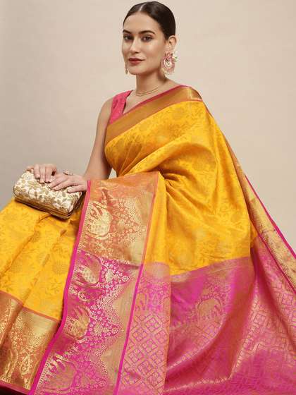 Royal Rajgharana
                        Saree Yellow & Gold Floral Zari Silk Blend
                        Celebrity Banarasi Sarees