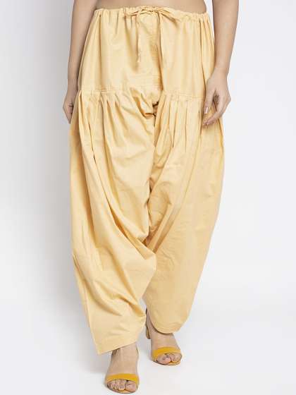 GRACIT Women Beige
                        Solid Loose Fit Cotton Salwar