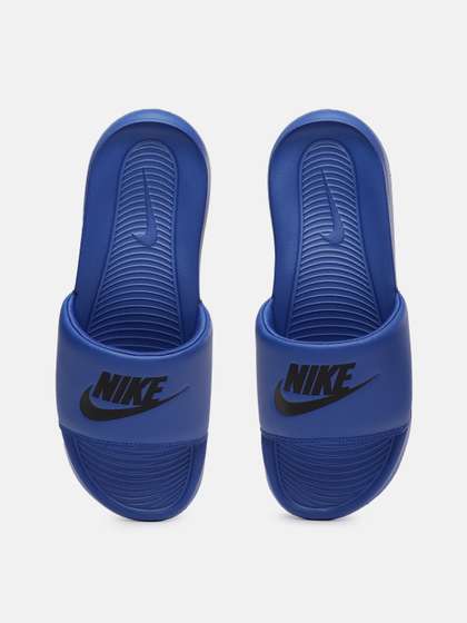 Nike Men Blue &
                    Black Printed VICTORI ONE Sliders
