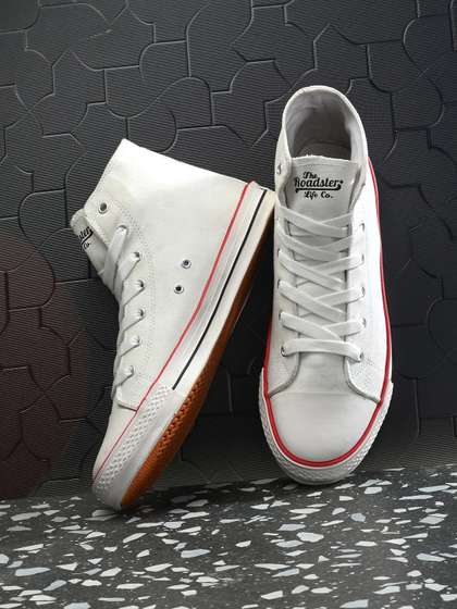 Roadster Men White
                          Solid Canvas Sneakers
