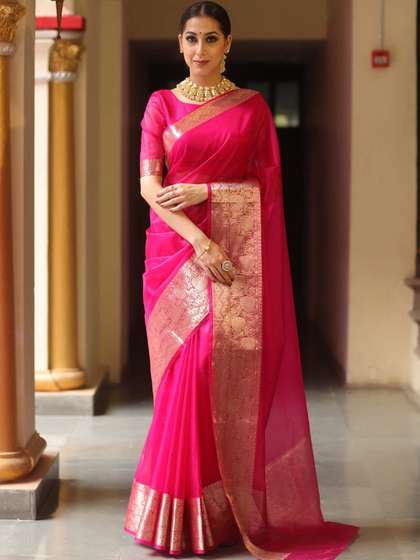 LeeliPeeri
                          Designer Solid Woven Design Zari Organza
                          Saree