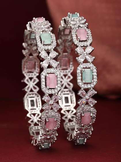 The Pari Set Of 2
                          Rhodium Plated American Diamond Stone Studded
                          Bangles