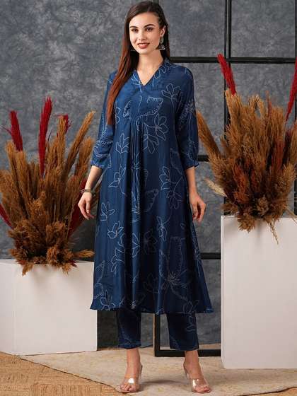GoSriKi Women Floral
                        Printed Regular Kurta with Trousers