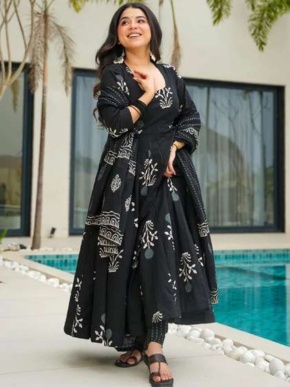 KALINI Women
                          Floral Printed Kurta with Trousers &
                          Dupatta