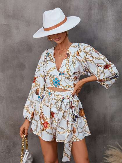 StyleCast White
                        Conversational Printed Cut-Outs V-Neck Playsuit