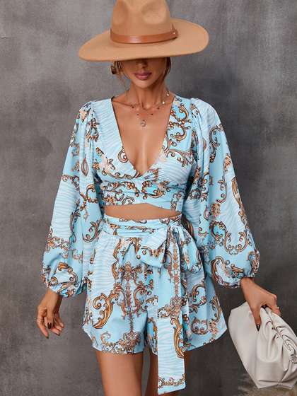 StyleCast Blue
                        Conversational Printed Cut-Outs V-Neck Playsuit