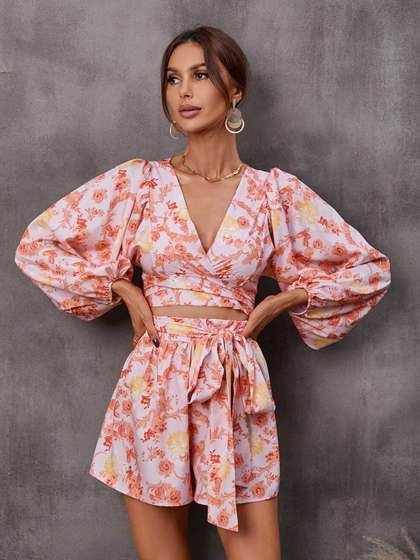 StyleCast Pink
                        Floral Printed Cut-Outs V-Neck Jumpsuit
