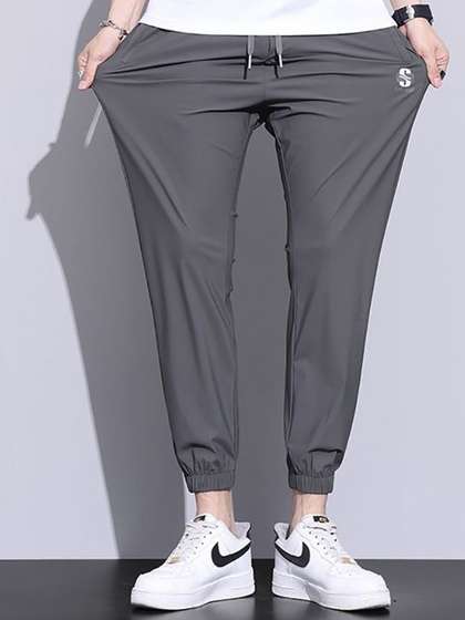 StyleCast x Revolte Solid Men Joggers Trousers