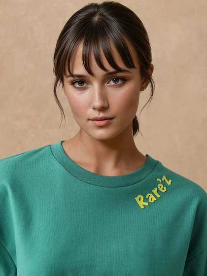 RAREISM Women Green
                        Graphic Print Oversized Fit Half Sleeve Crew
                        Neck T-Shirt