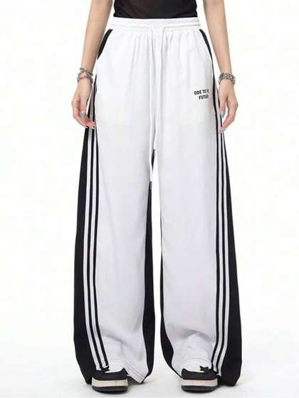 The Roadster
                          Lifestyle Co. Women Loose Fit High-Rise Cargo
                          Trousers