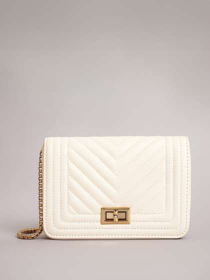 Lino Perros
                        Structured Sling Bag with Quilted Detail