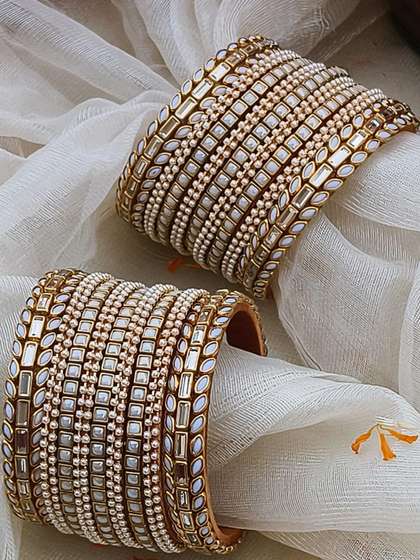ADVIKA CREATIONS
                        Women Pack of 2 set Plastic Silk Thread Bangle
                        Set