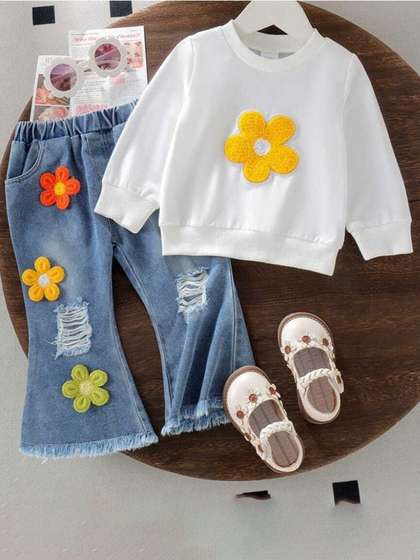 I NAINA DRESSES
                        Girls Embroidered Long Sleeves Sweatshirt With
                        Jeans