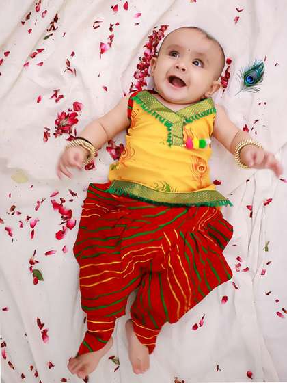 KID1Girls Ethnic
                        Motifs Printed Mor Pankh Halter Neck Pure Cotton
                        Kurti With Dhoti Pants