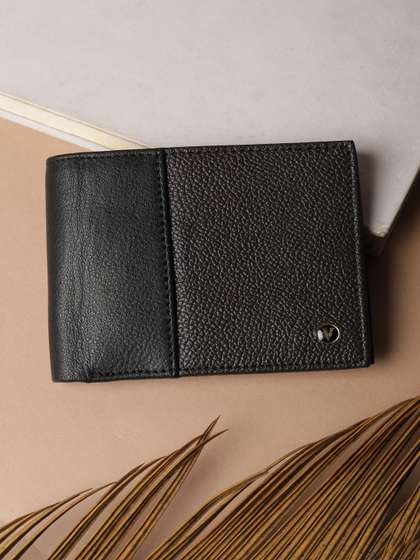 Van Heusen Men Leather
                    Two Fold Wallet