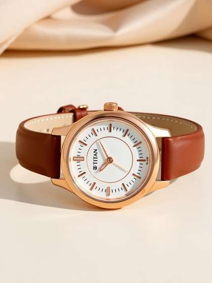Titan Quartz Analog
                        With Silver Dial Watch For Women - 2638wl01