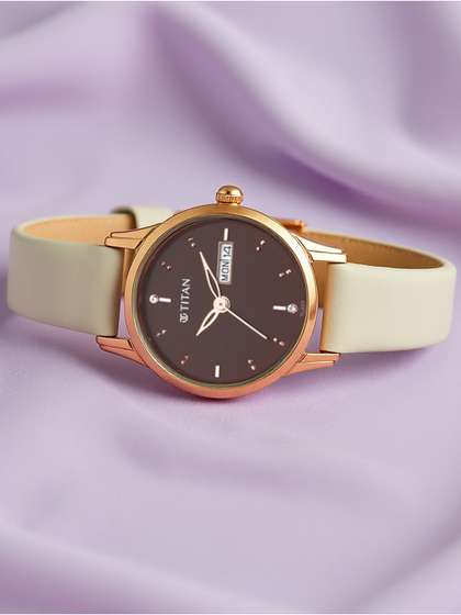 Titan Lagan Quartz
                        Analog With Brown Dial Watch For Women -
                        2656wl01