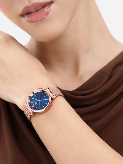DressBerry Women
                        Bracelet Style Straps Analogue Watch
                        UT-A8647-NY-DB