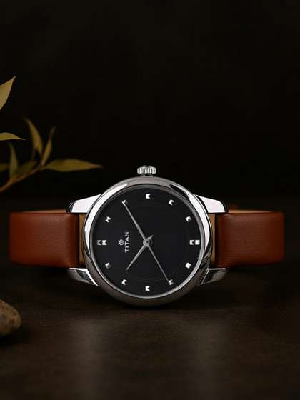 Titan Workwear Chic
                      Minimalist Quartz Analog With Black Dial Watch For
                      Women - Np2481sl07