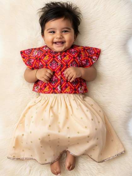 Sangria Girls Off White
                    Zari Lehenga and Pink Patola Choli Set