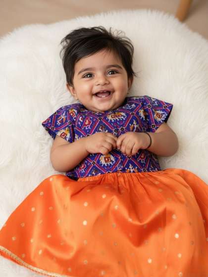 Sangria Girls Silk
                    Orange Zari Lehenga & Blue Patola Blouse