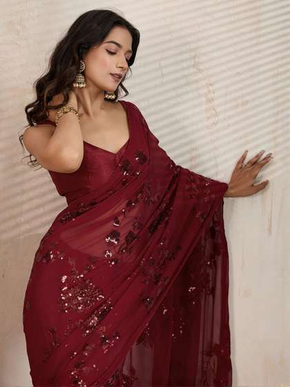 FashionsEye Floral
                      Embroidered Pure Georgette Saree And Unstiched
                      Blouse Piece