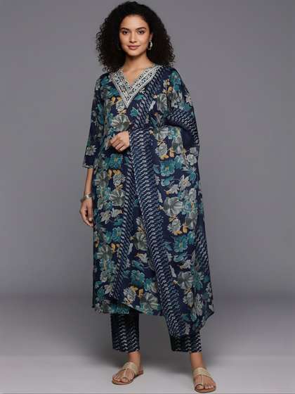 Varanga Women
                          Floral Printed Regular Thread Work Kurta with
                          Trousers & With Dupatta