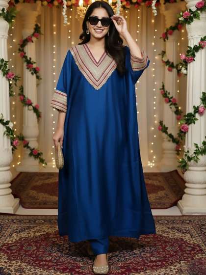 Varanga Women
                          Ethnic Motifs Embroidered Regular Thread Work
                          Kurta with Trousers
