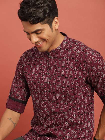 Taavi Men Maroon
                          & Black Bagru Printed Straight Kurta with
                          Roll-Up Sleeves