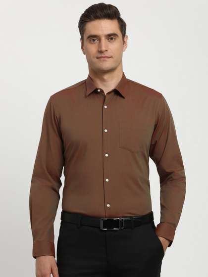 Peter England Men Slim
                      Fit Solid Spread Collar Formal Shirt