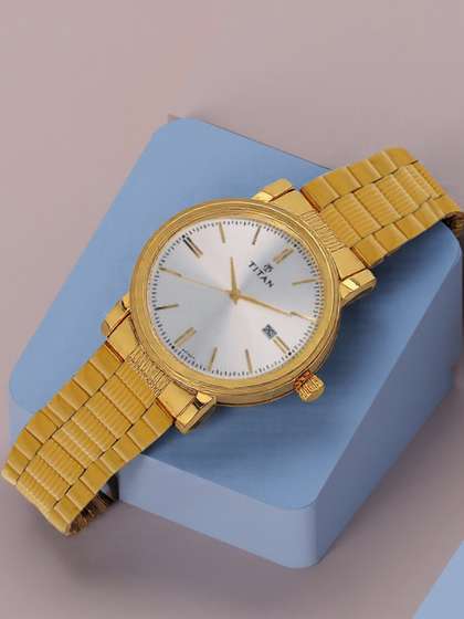 Titan Karishma Quartz
                    Analog With Silver Dial Watch For Men - Nt1712ym02