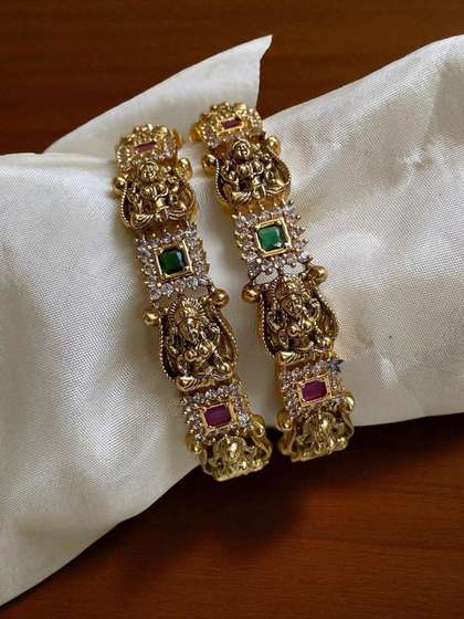 The Pari Set Of 2
                        Gold-Plated American Diamond-Studded Bangles