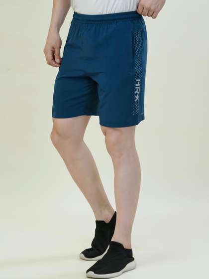 HRX by Hrithik
                        Roshan Men Regular Fit Mid-Rise Sports Shorts