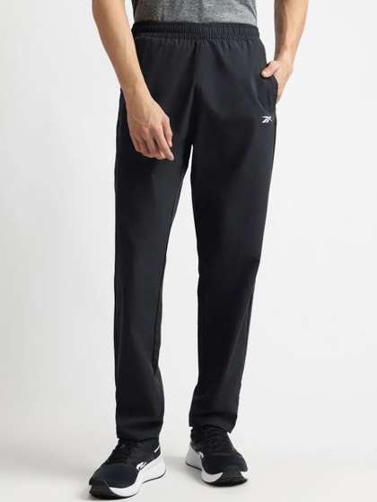 Reebok Men
                        Logo-Printed Elasticated Mid-Rise Track Pants