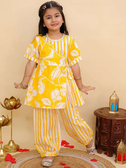 Aj DEZInES Girls Floral
                    Printed Cotton Kurti with Salwar