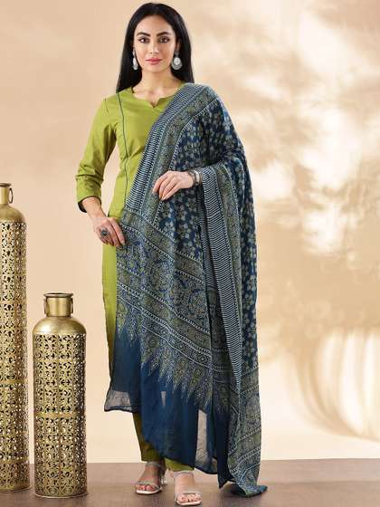 Anouk Women Solid
                          Cotton Kurta with Trousers & Dupatta