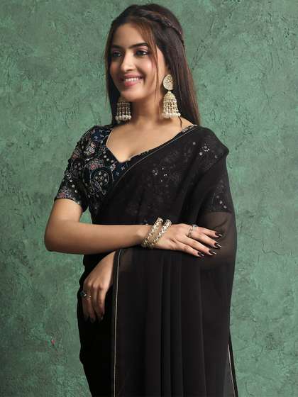 all about you
                          Solid Saree With Heavy Embroidered Blouse