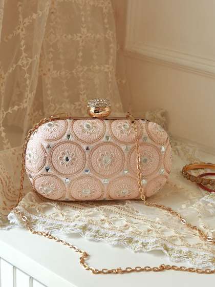 THE TAN CLAN
                          Inaara Embroidered Oval Box Clutch