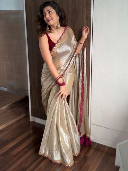 Moda Rapido
                          Sequinned Tissue Bandhani Saree