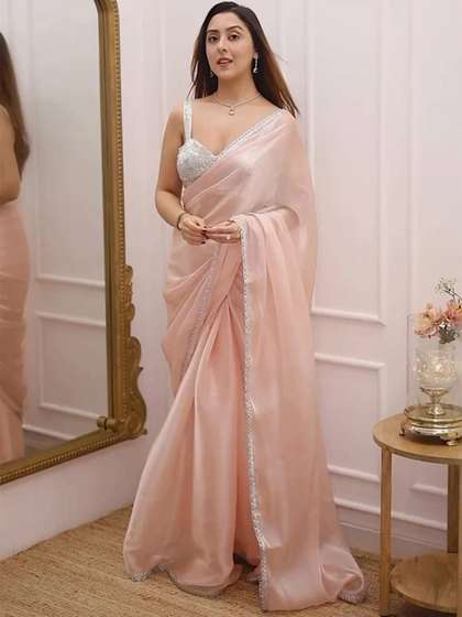 HERE&NOW
                        Embroidered Border Organza Saree With Blouse
                        Piece