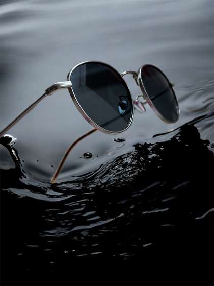 The Roadster
                          Lifestyle Co. Unisex Round Sunglasses With UV
                          Protected Lens RD 2339 silver