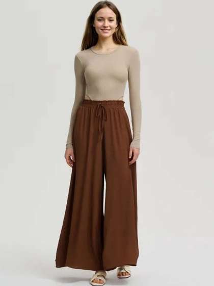 Stylecast X Kotty
                        Women Solid Loose Fit High-Rise Trousers