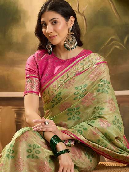 Sangria Woven
                          Design Floral Patola Saree